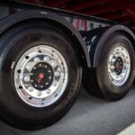 how much does a semi truck tire weigh
